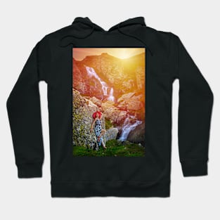 Woman by waterfall at sunset Hoodie